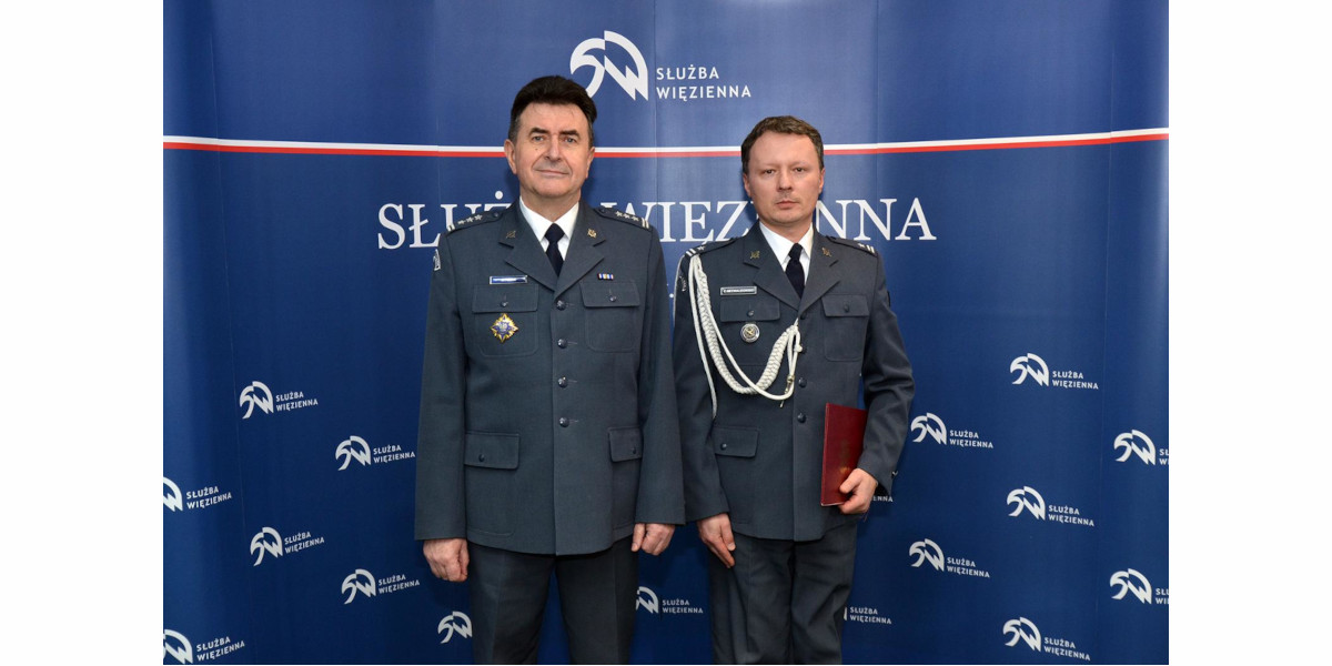 Two men dressed in police uniforms.